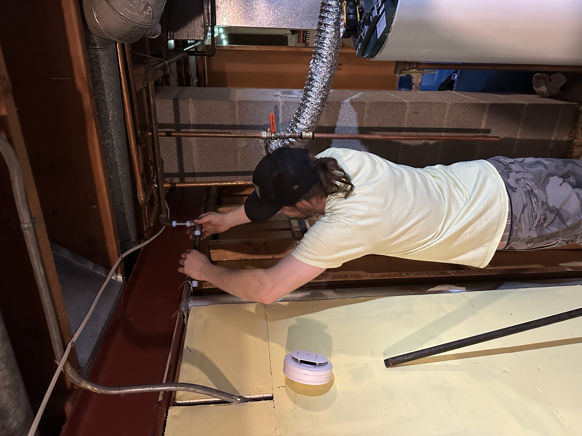 Joe working hands-on — bathroom renovation